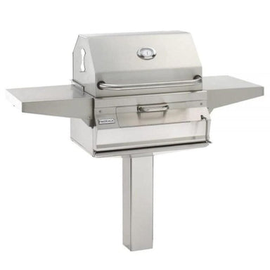 The Fire Magic 24" Post Mount Stainless Steel Charcoal Grill features a 432 sq. in. cooking surface, all stainless steel construction, and a heavy-duty stainless smoker hood with a precise analog thermometer. 